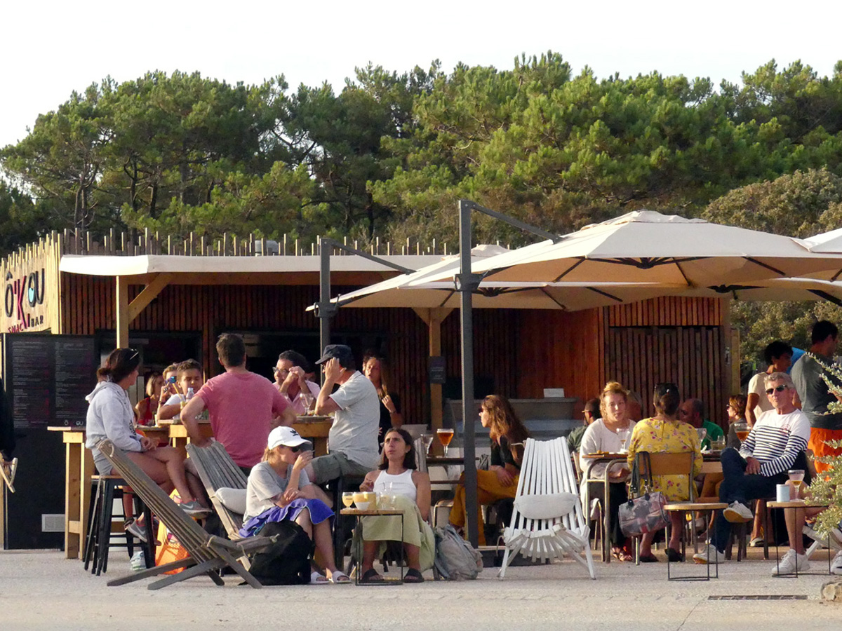 Relax in a beachside cafe at Veillon Plage
