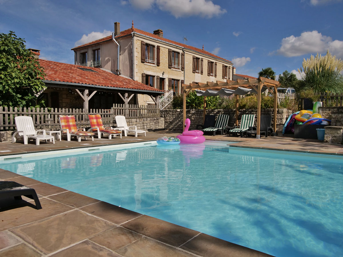 The heated pool at Maison Lairoux Holiday Cottages