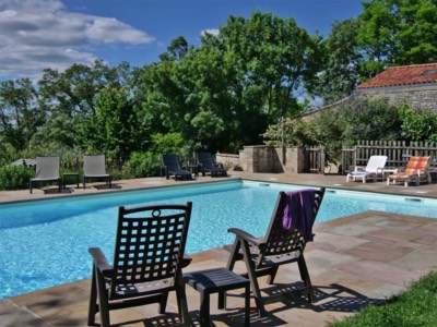 Relax around the pool at Maison Lairoux