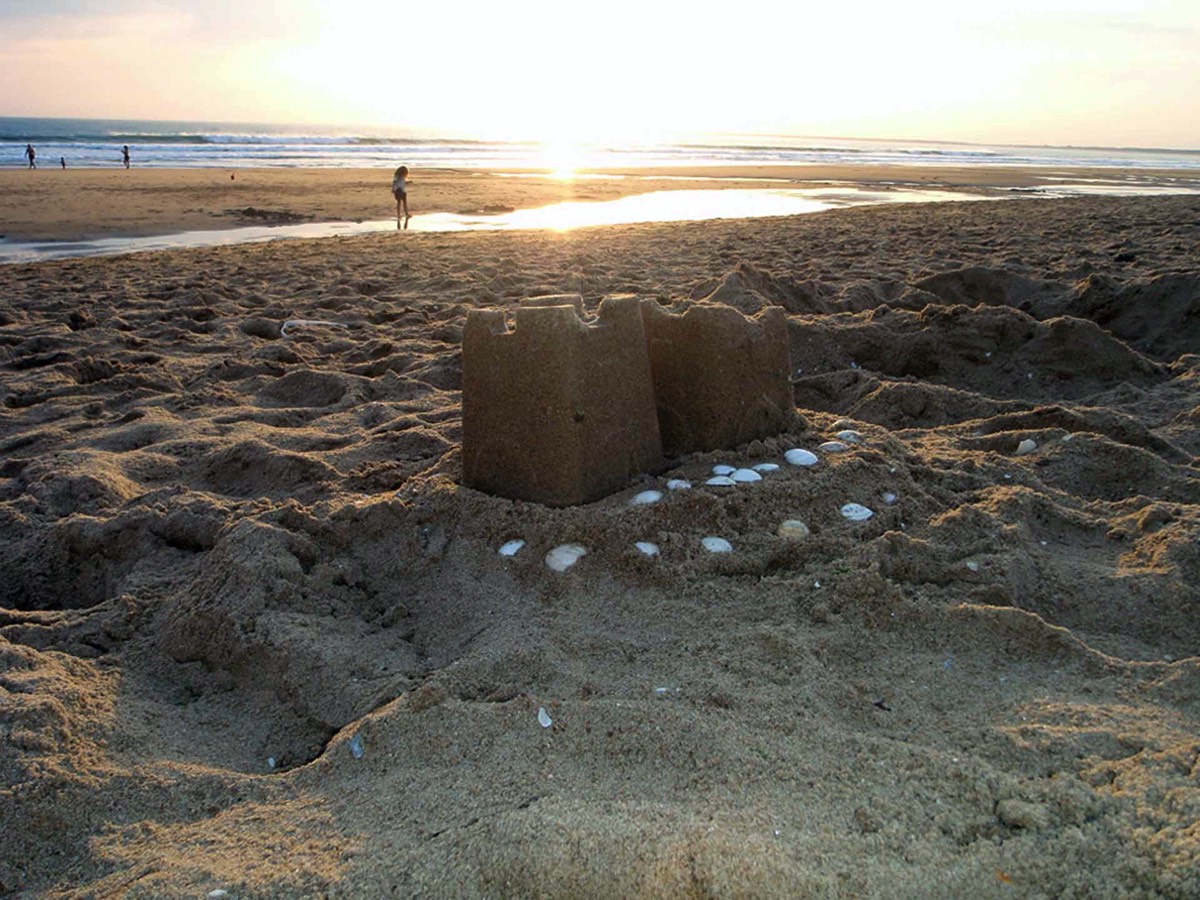 Sandcastles and a sunset at Les Conches beach
