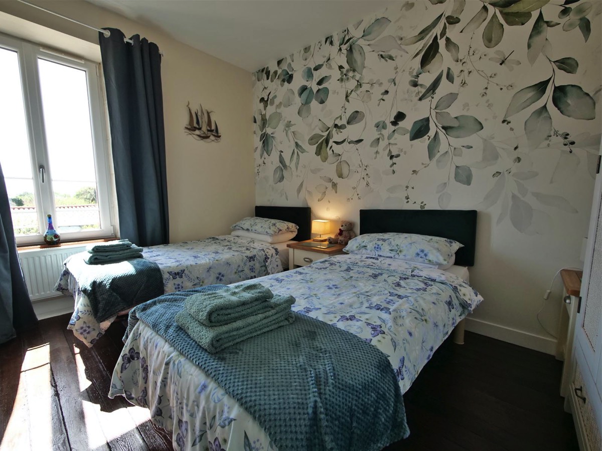 Newly renovated twin bedroom at Le Vieux Cafe