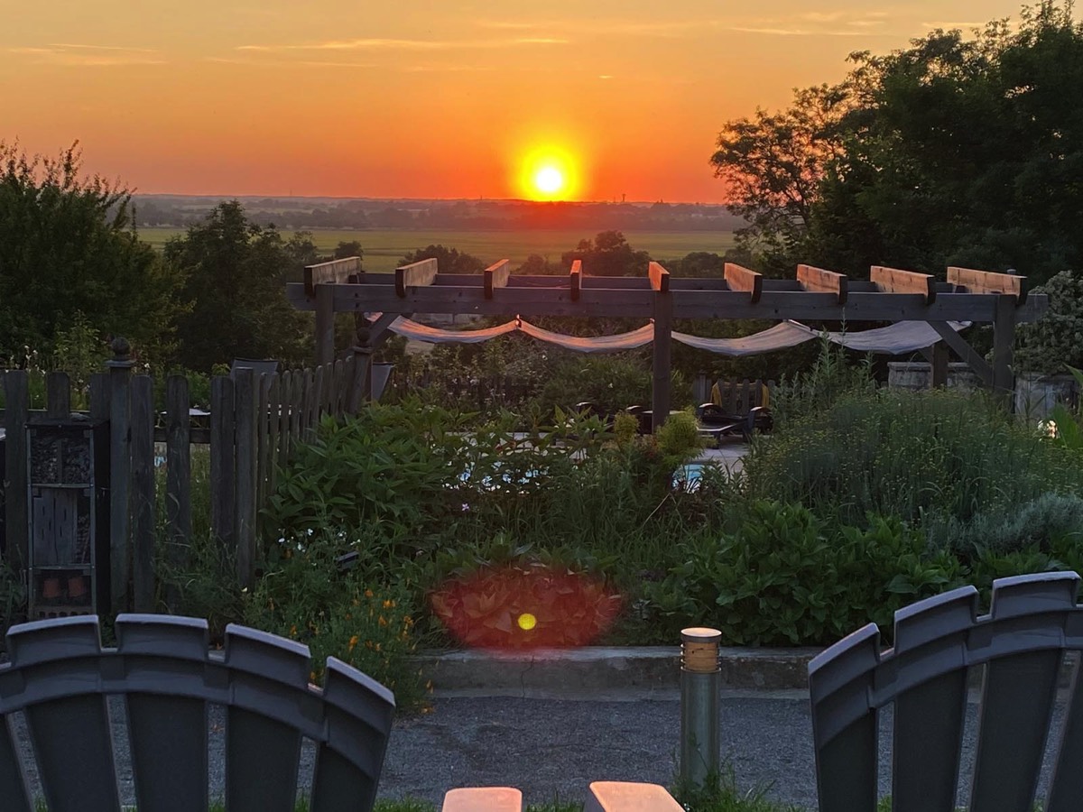 Sunset over the wetland valley at Le Vieux Cafe