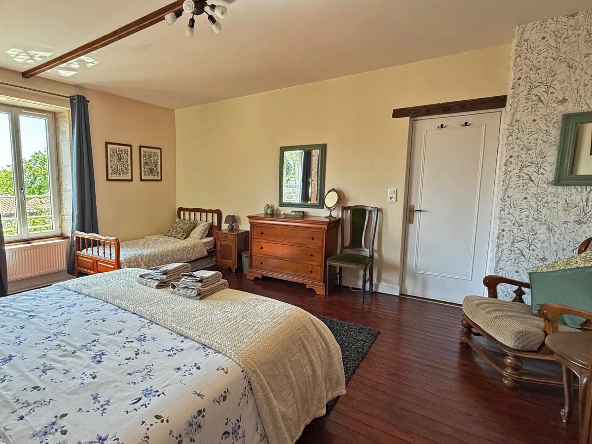 Extra single bed in the master bedroom at Le Vieux Cafe