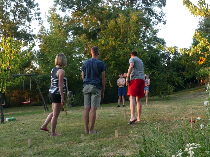 Playing Kubb in the garden at Maison Lairoux