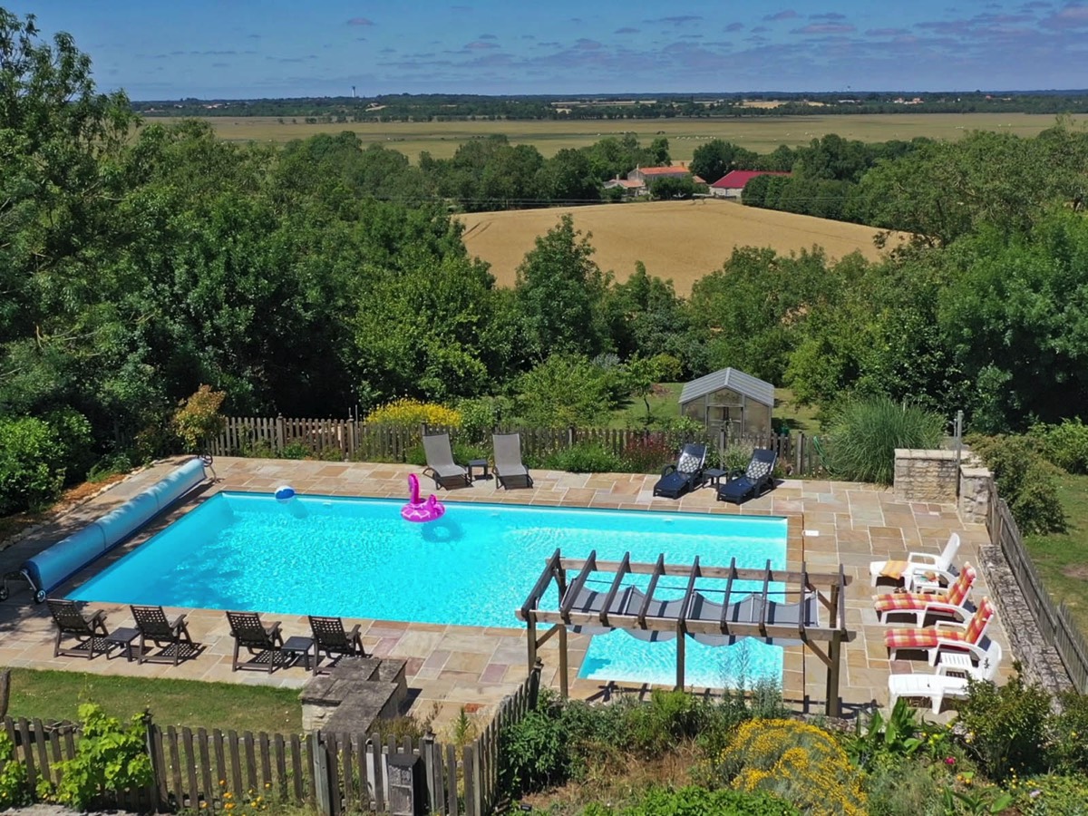 Valley views from the pool at Maison Lairoux Holiday Cottages