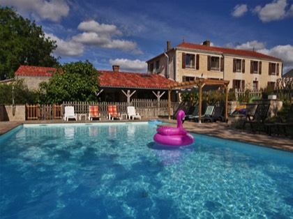 Relax by the Pool at Maison Lairoux Holiday Cottages