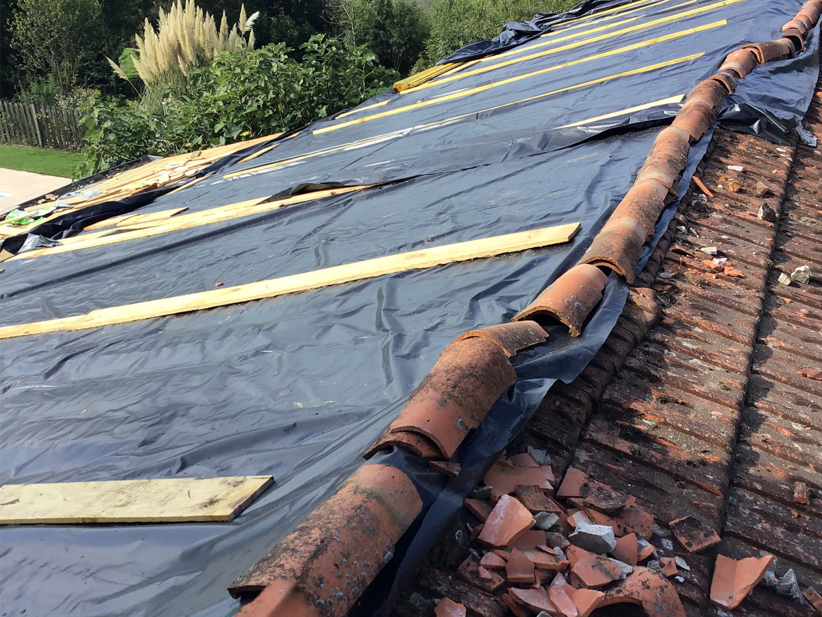 Removing old tiles on our roof