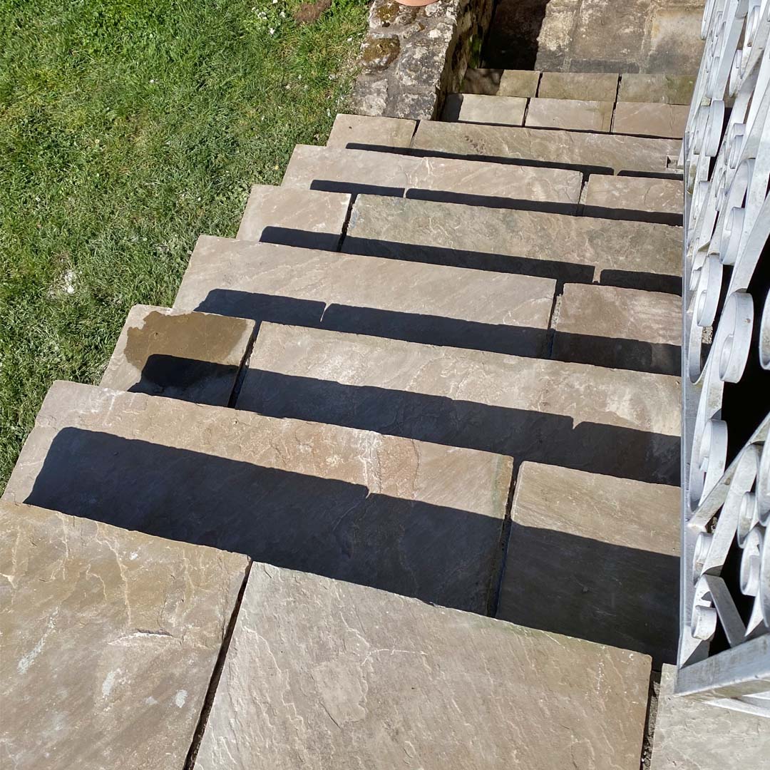 Steps down to the veranda at Maison Lairoux