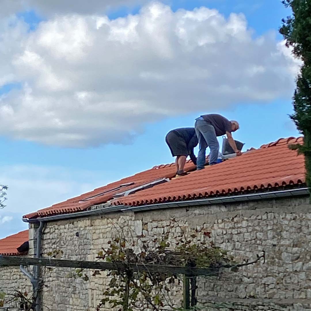 Working on the roof at Maison Lairoux
