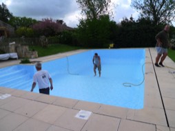 Putting a new liner in the pool at Maison Lairoux